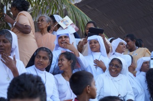 We stood right in front of a seat row of nuns.  Their reactions during the mass were priceless.
